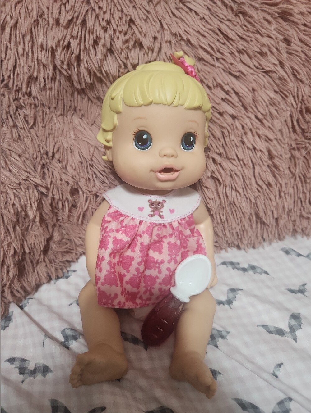 Hasbro Baby Alive Make Me Better baby doll with blonde hair